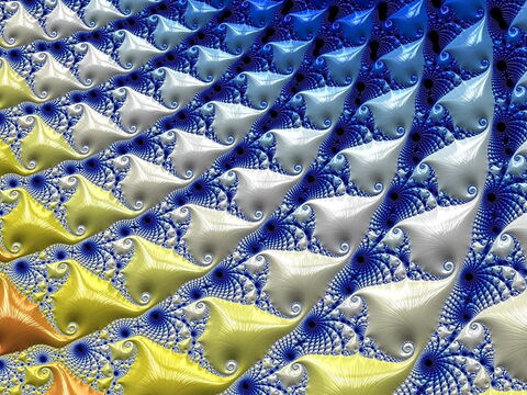 Grafik: Diese Fraktale sehen aus wie ein riesiger Muschelteppich am Strand. Ihre Farben wandeln von orange über gelb hin zu weiß und blau.